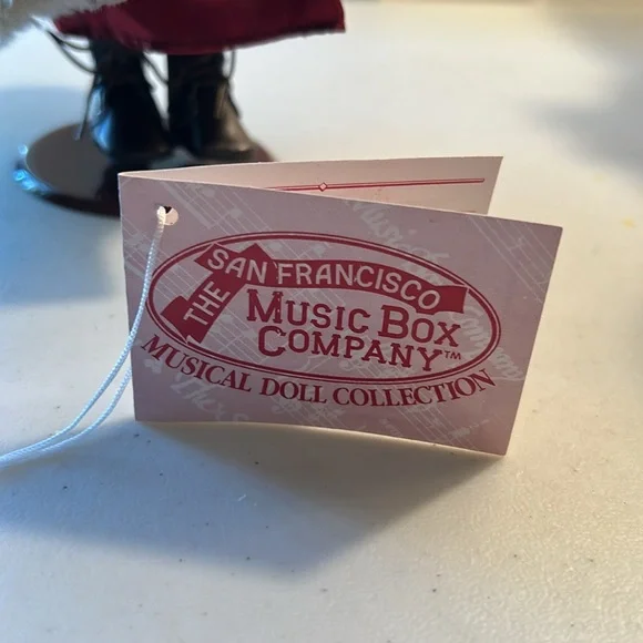 San Francisco Music Box Porcelain Doll Plays Christmas Song Chestnuts Roasting